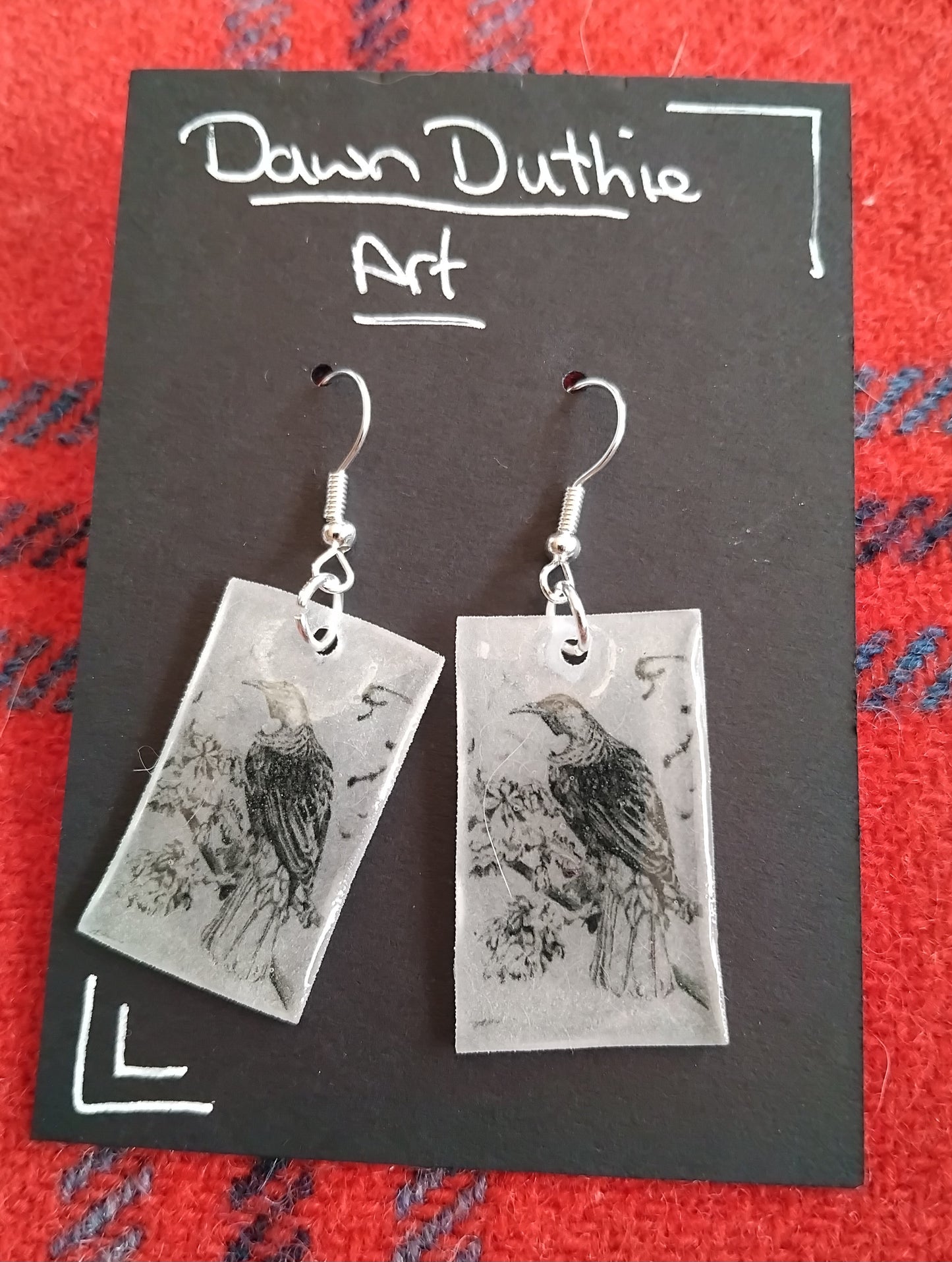 Tui, piwakawaka or weta graphite drawing earrings.