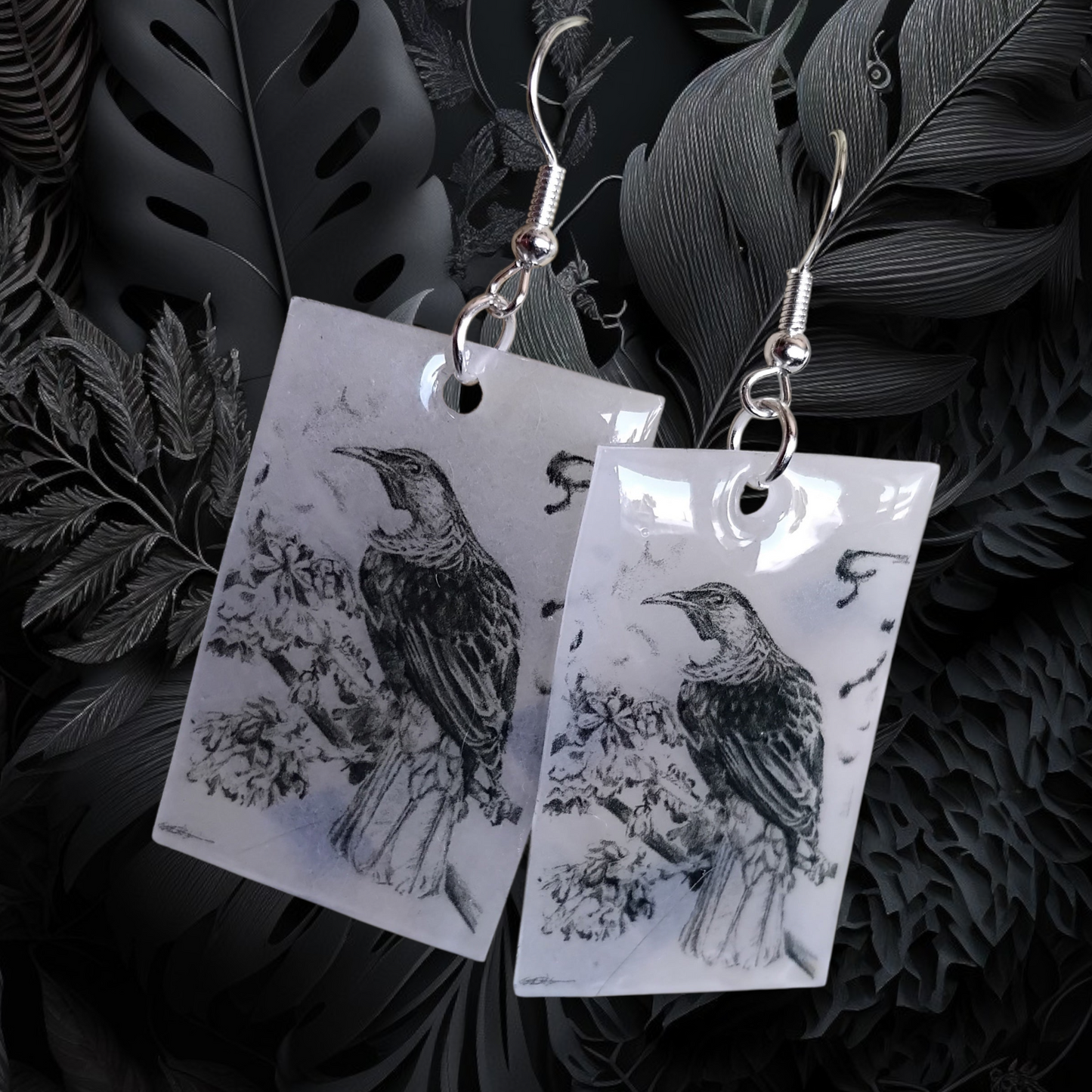 Tui, piwakawaka or weta graphite drawing earrings.