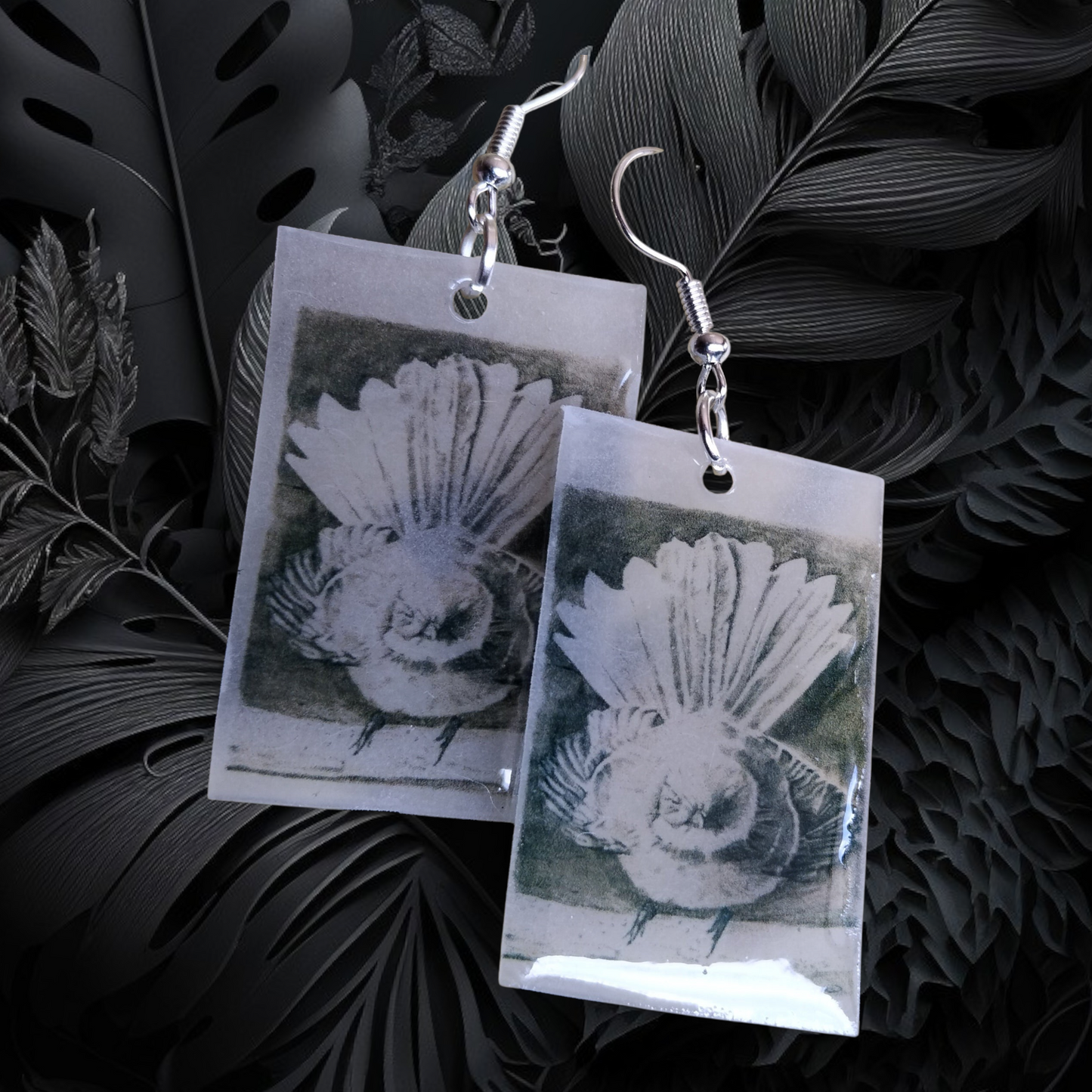Tui, piwakawaka or weta graphite drawing earrings.