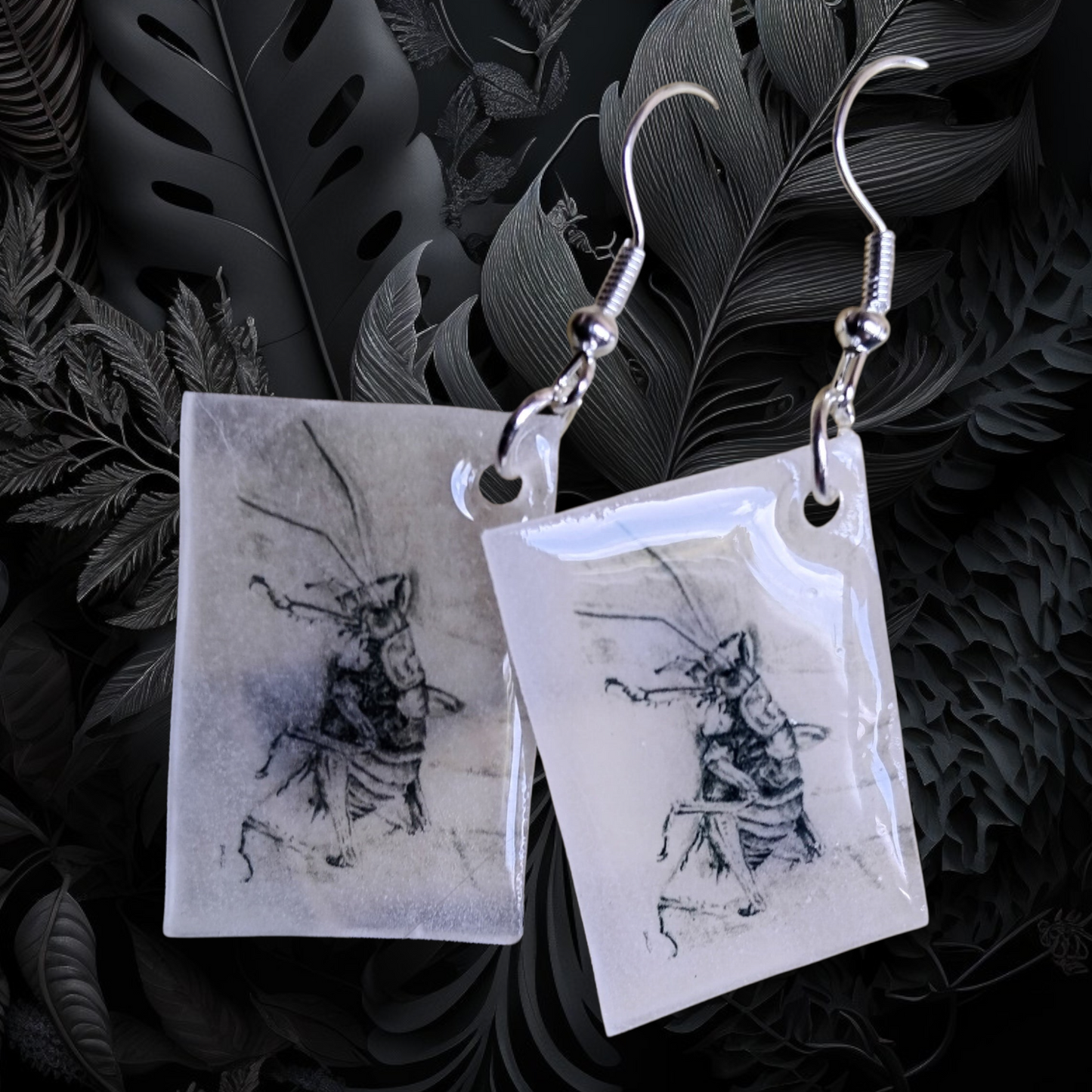 Tui, piwakawaka or weta graphite drawing earrings.